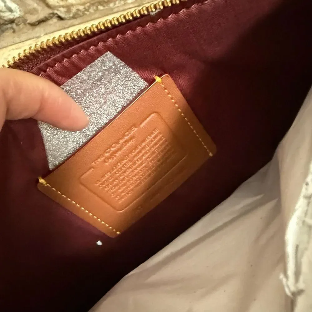 NWT Coach coffee shop exclusive turn lock pouch